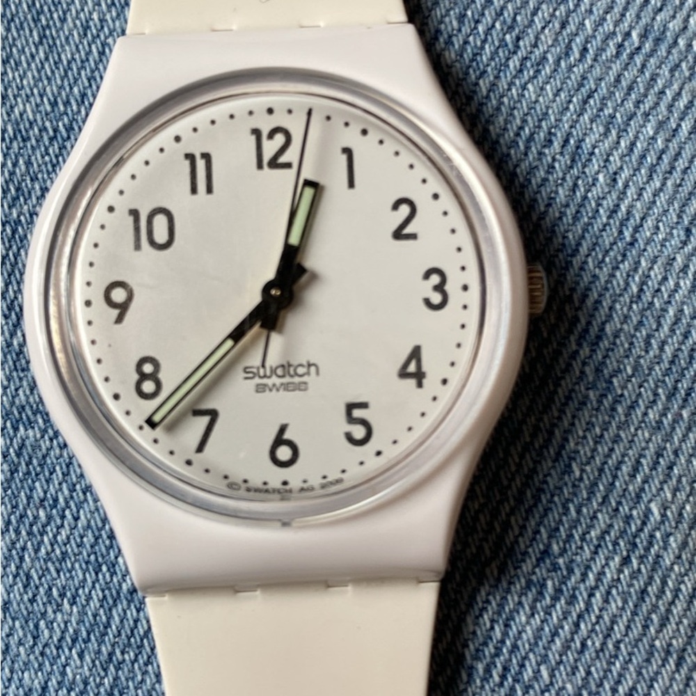 Swatch White Watch with Black Numerals and Luminous Hands